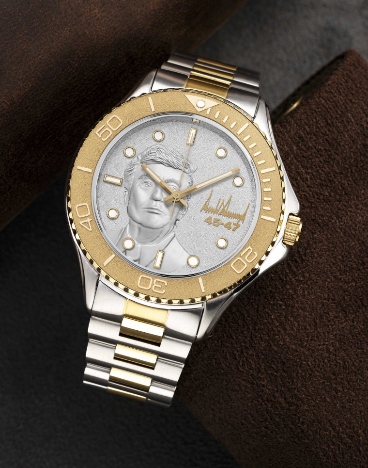 Two-tone gold and silver wristwatch with engraved face, signature, and 45-47 numbering.