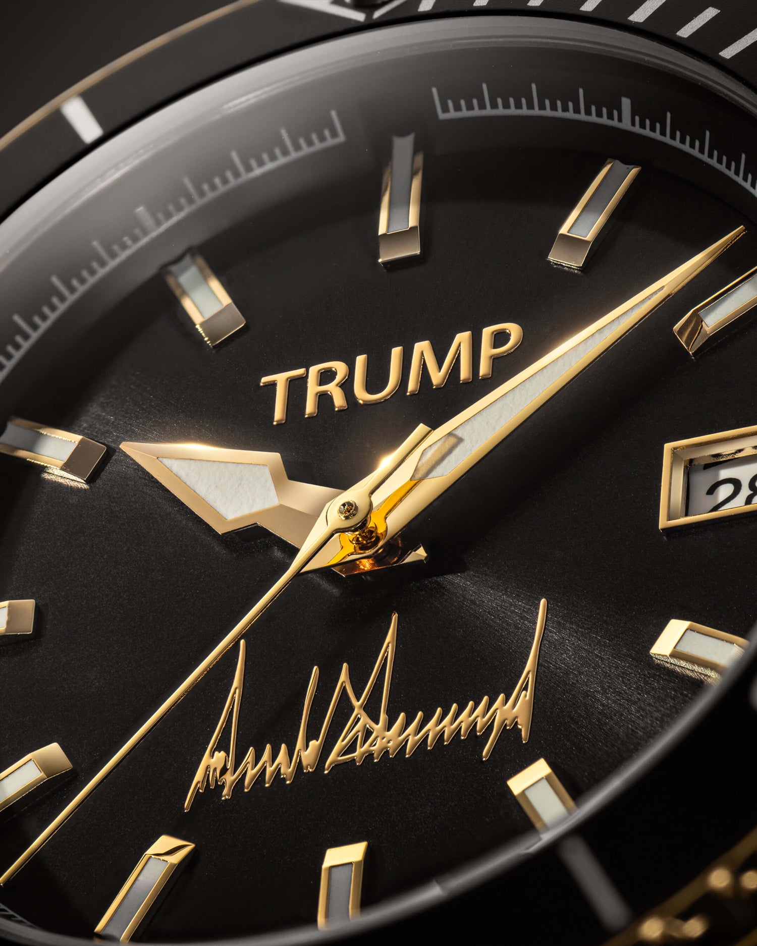 Close-up of black and gold Trump wristwatch with signature and date display on dial.