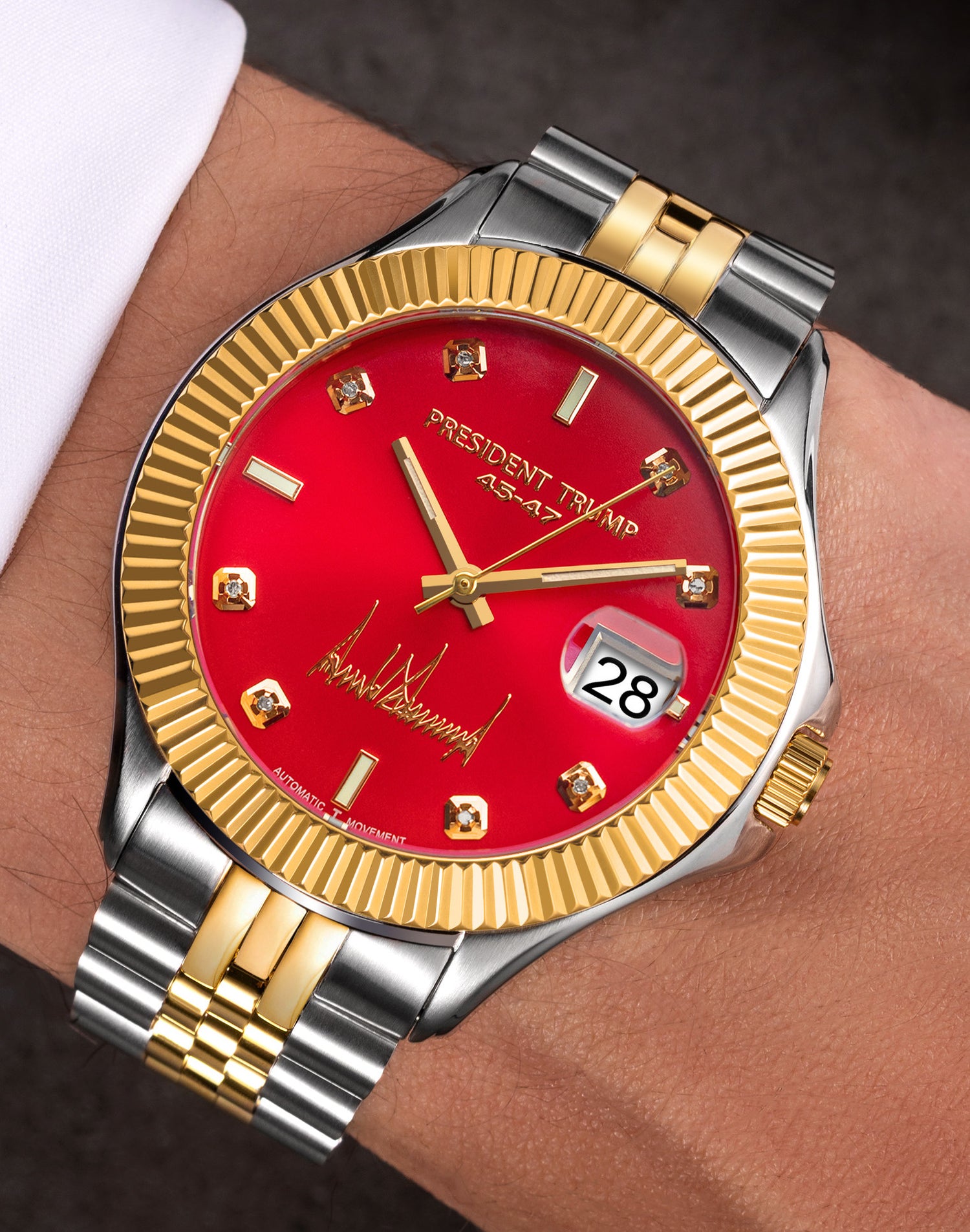 Gold and silver wristwatch with red dial, diamond hour markers, and “President Trump” text.