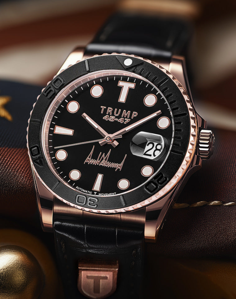 Luxury black and gold Trump wristwatch with leather strap, date display, and signature dial.