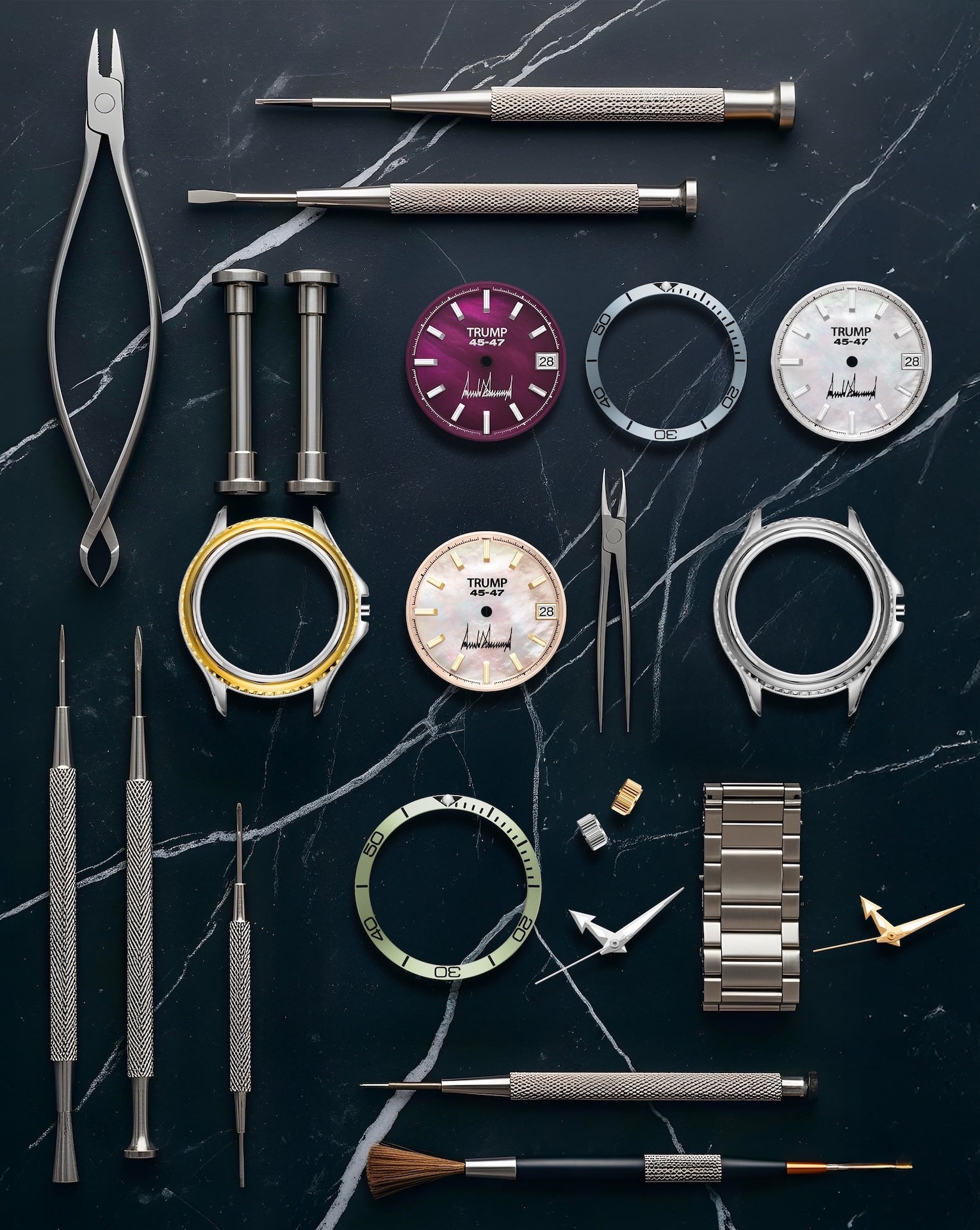 Watchmaking tools and Trump 45-47 dials arranged on black marble surface with metal parts.