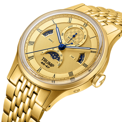 Gold wristwatch with detailed face on a white background